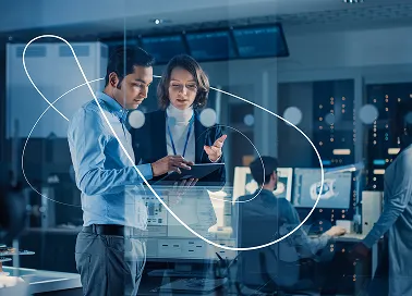 Two corkers in an office working.