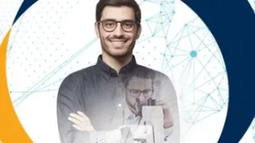 Person with glasses smiling, holding a book, overlay of lab work.
