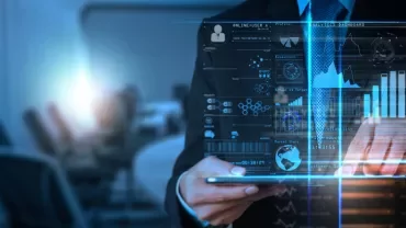 Person interacting with a futuristic digital dashboard overlay.
