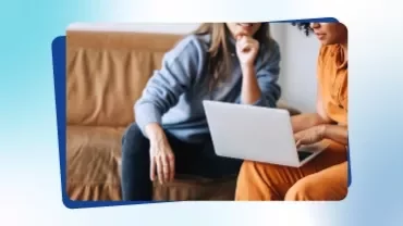 Promotional tile from Talent Trends 2026 featuring two women pointing at a computer screen