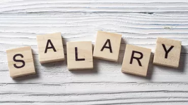 Wooden blocks spelling the word 'SALARY' on a white background.