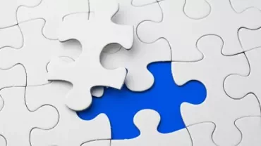 White puzzle piece near a blue gap.
