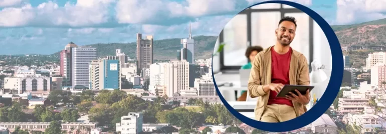 Smiling person holding a tablet with a cityscape in the background.