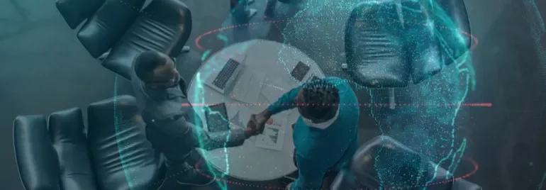 Top view of two people shaking hands over a table with digital globe overlay.