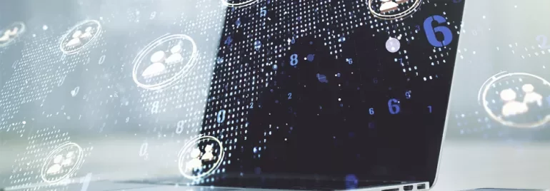 Laptop with digital graphics of network connections and people icons.