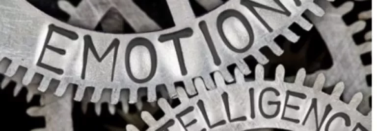 Rouages imbriqués avec les mots : Intelligence Émotionnelle.