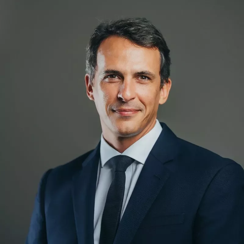 Man in a blue suit and tie
