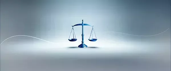 Scales of justices icon with a blue background.