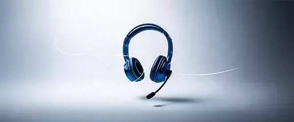 A blue headphones with a grey background.