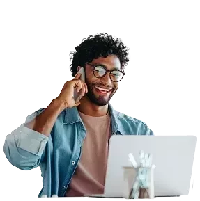 A man in an office making a business call.